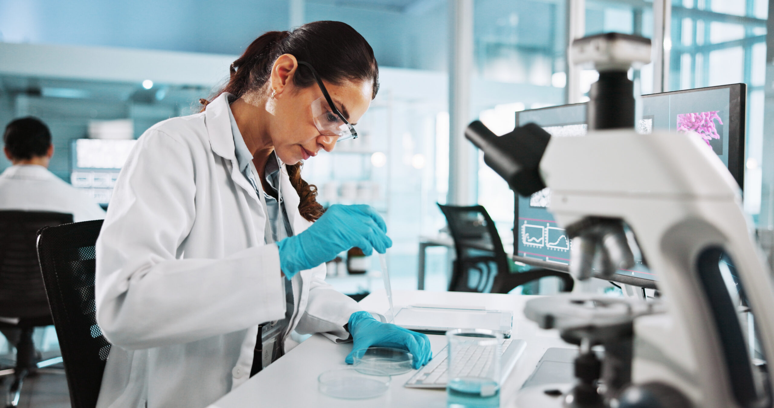 Scientist, woman and petri dish with research for biology, innovation or medical notes analysis. Biotech, laboratory and microscope with DNA study for pharmaceutical RNA or pathology experiment.